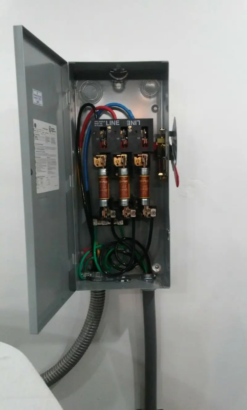 Three-phase disconnect switch installed for Smoke Detector Installation in Austin
